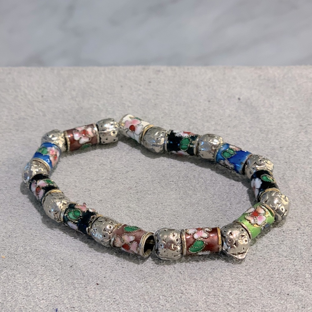 Layering bracelet with floral designs